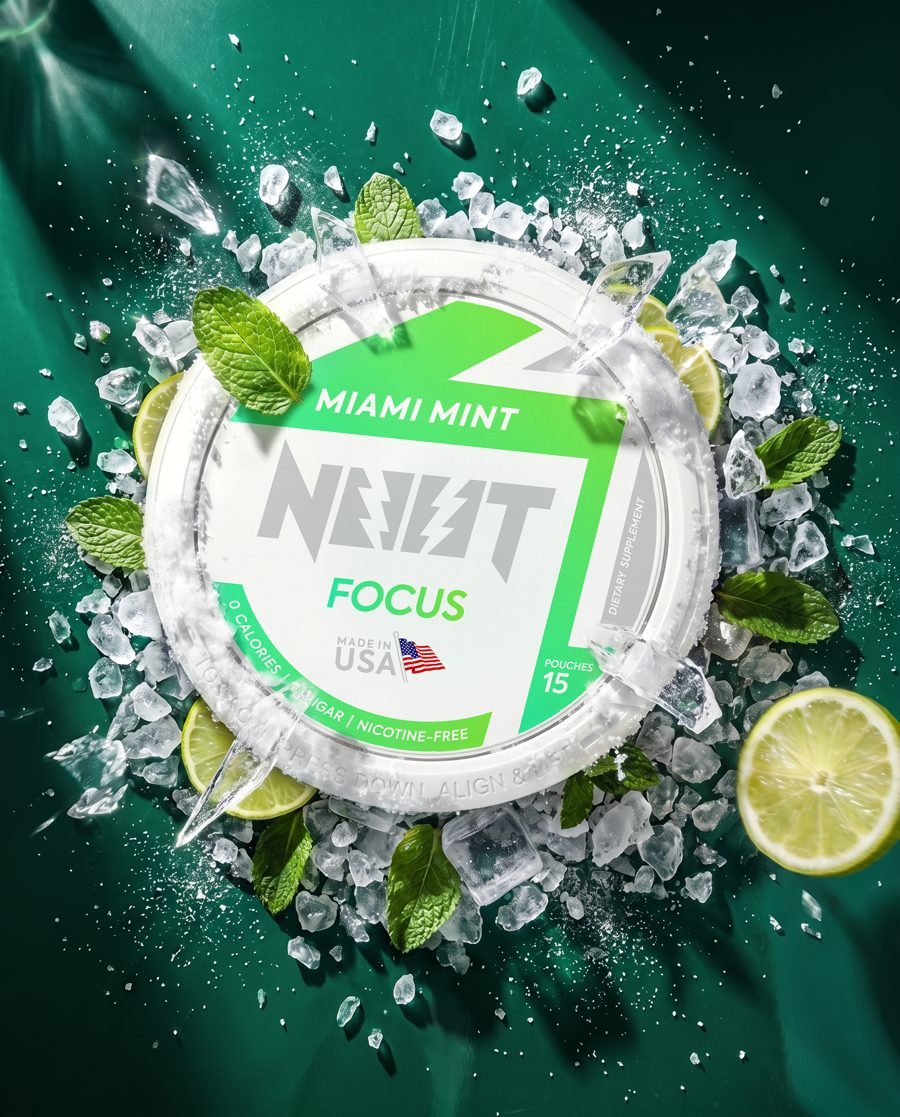 Miami Mint tin in crushed ice with mint leaves and lime